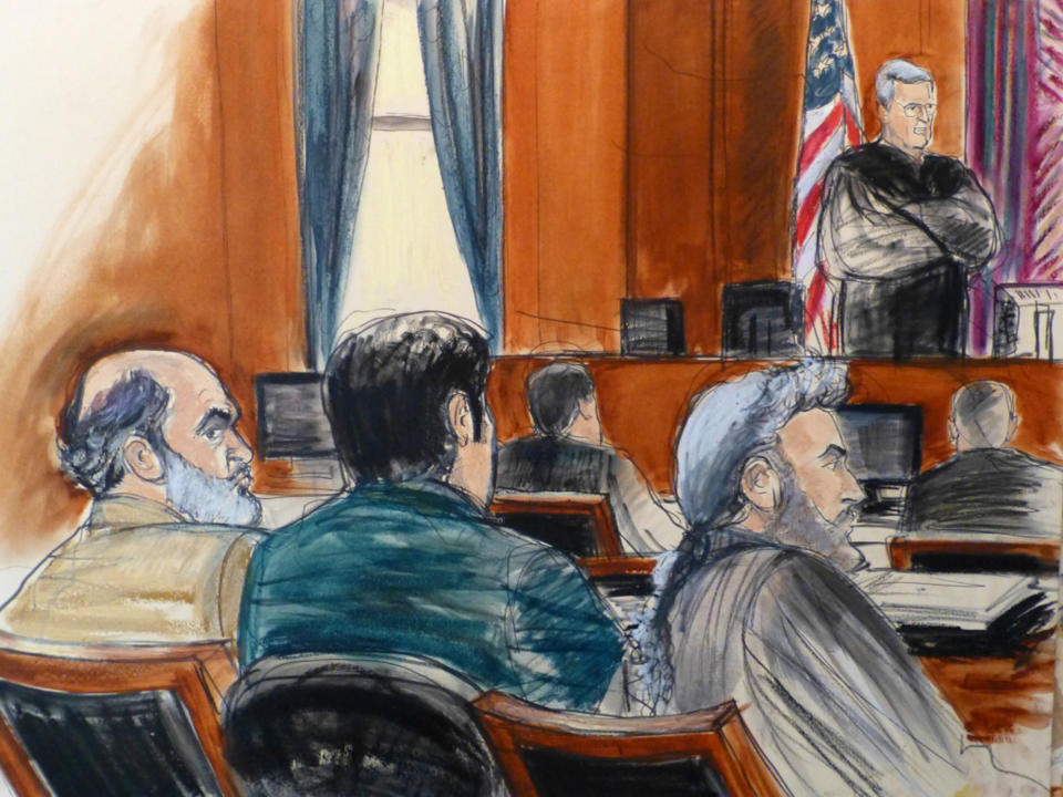 In this March 3, 2014, courtroom sketch from files, defense attorney Stanley Cohen, right, sits next to a translator during the jury selection for Cohen's client Sulaiman Abu Ghaith, left, Osama bin Laden's son-in-law, during Abu Ghaith's trial in New York on charges that he conspired to kill Americans and support terrorists in his role as al-Qaida's spokesman after the Sept. 11 attacks. It can be an uncomfortable life for any defense attorney representing unpopular clients, but lawyers who agree to speak on behalf of people accused of plotting to kill Americans in terrorist attacks walk difficult road. Cohen says, “You get stigmatized. Folks avoid you. You get ostracized. It’s terrible for a mate to see terrible publicity, to see you vilified, to avoid social settings because you know it will lead to confrontations.” (AP Photo/Elizabeth Williams, File)