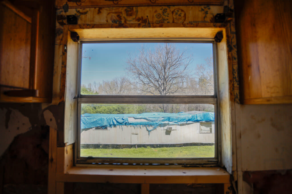 The view of a camper from a window