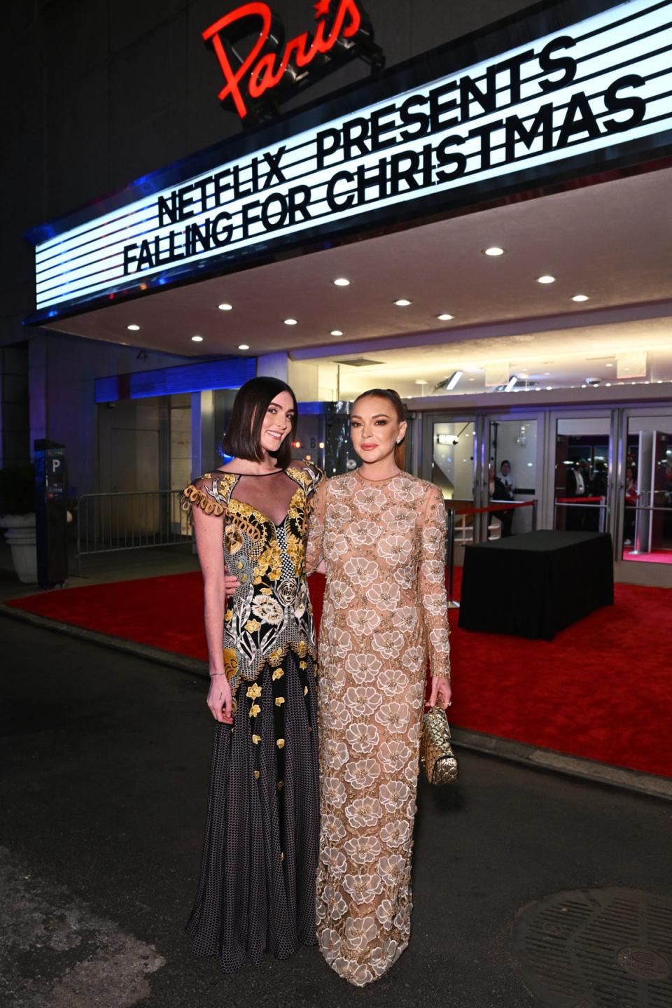 Aliana Lohan and Lindsay Lohan at Netflix’s Falling For Christmas Celebratory Holiday Fan Screening, in Valentino (Getty Images for Netflix)