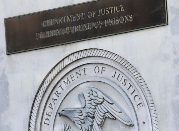 PHOTO: A sign for the Department of Justice Federal Bureau of Prisons is displayed at the Metropolitan Detention Center in the Brooklyn, New York. (Mark Lennihan/AP, FILE)