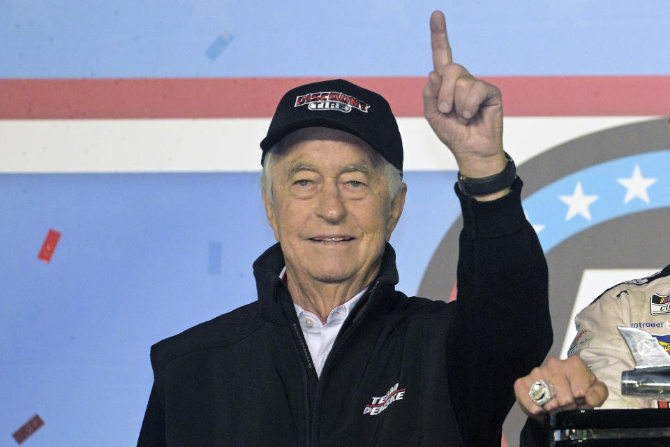 FILE - Roger Penske gestures in Victory Lane after the NASCAR Daytona 500 auto race at Daytona International Speedway in Daytona Beach, Fla., Sunday, Feb. 20, 2022. Penske has a chance for a NASCAR championship three-peat after racer Ryan Blaney won the organization's second straight series crown this year, following teammate Joey Logano's title in 2022. (AP Photo/Phelan M. Ebenhack)