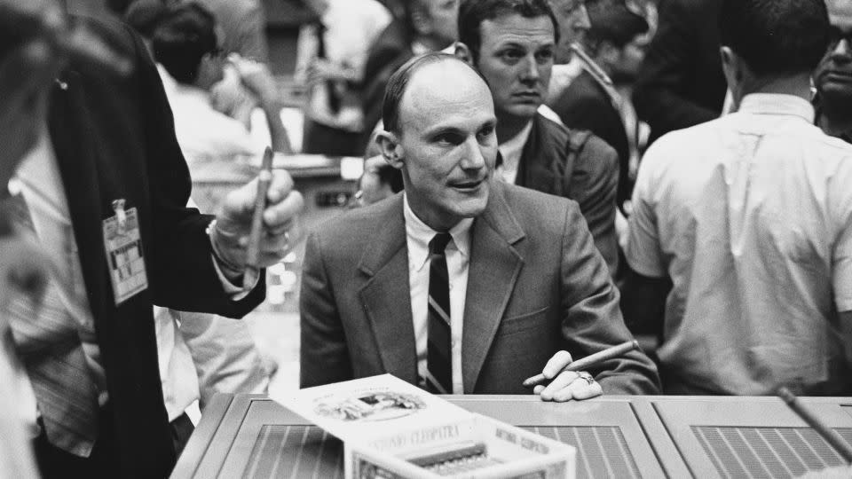 Astronaut Thomas Mattingly II celebrates the successful rescue of the Apollo 13 spacecraft and crew with a box of cigars at the Mission Control of the Manned Spacecraft Center in Houston. - Space Frontiers/Archive Photos/Getty Images