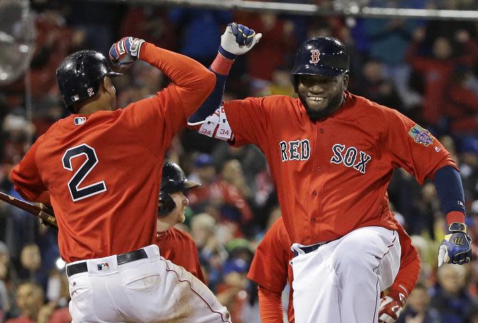 David Ortiz celebrates his two-run home run with Xander Bogaerts. (AP)