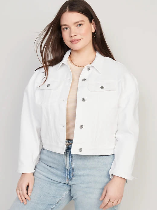 woman wears Cropped White-Wash Jean Jacket Old Navy.