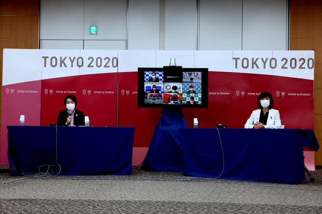 Tokyo 2020 president Seiko Hashimoto, left, and Tokyo Olympics Minister Tamayo Marukawa make the announcement on Thursday