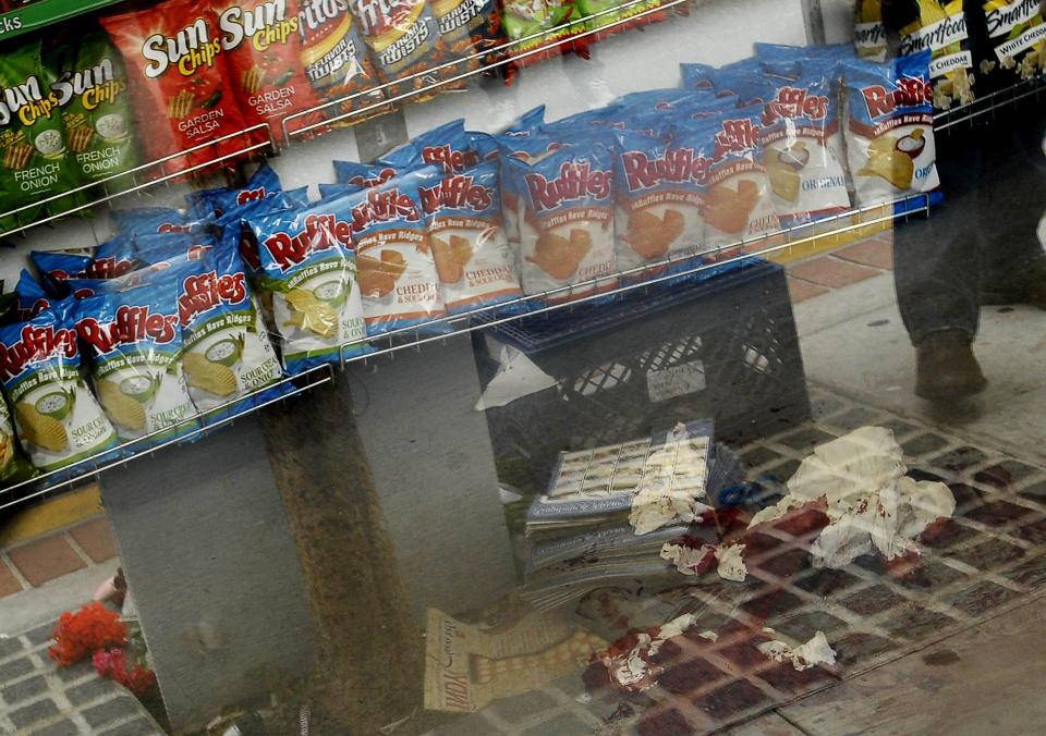 Blood is seen inside the I.V. Deli after a series of drive -by shootings that left 6 people dead in the Isla Vista section of Santa Barbara