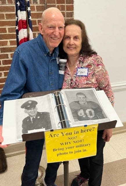 Leon and Karen Bradley pose in front of pictures from Leon’s service days. Anderson County Director of Veterans Service Officer Leon Jaquet continues to build a pictorial collection of county veterans that is displayed in his office, as well as at the monthly Veterans Appreciation Breakfast in Clinton.