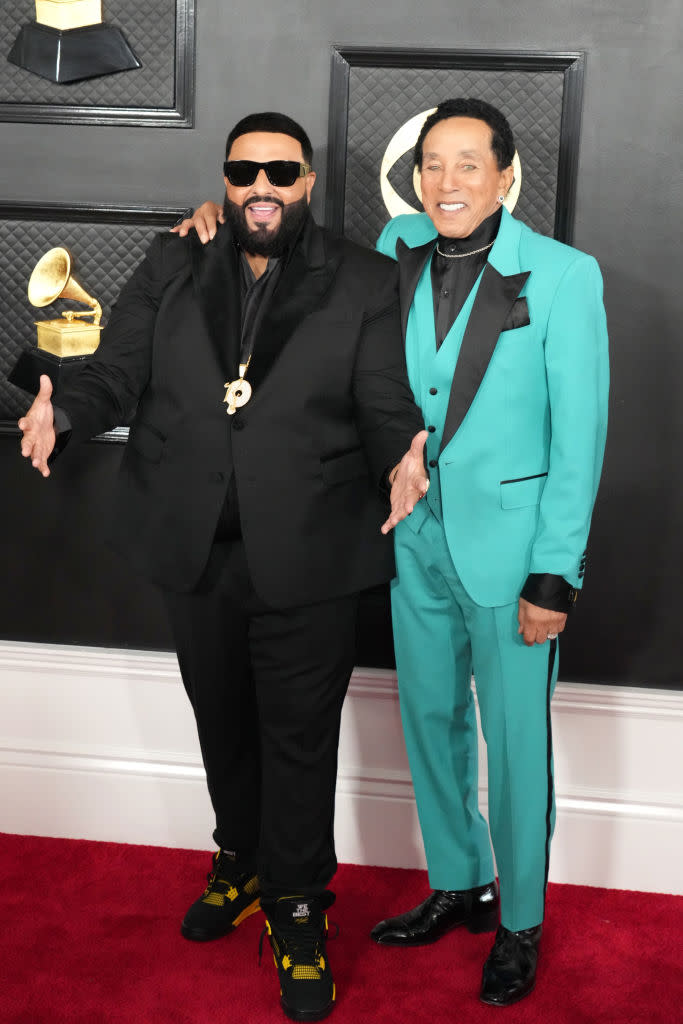 DJ Khaled in all-black suit and Smokey Robinson in stunning aqua suit with black lapels given to him by his wife.