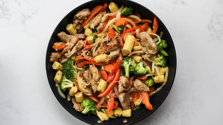 pork vegetable stir-fry in skillet