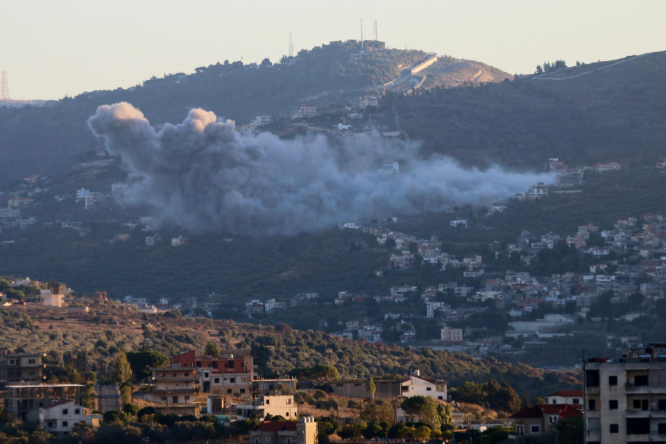 Smoke rises from the southern Lebanese village of Kfar Kila Wednesday amid ongoing cross-border hostilities between Hezbollah and Israel. (Karamallah Daher/Reuters)