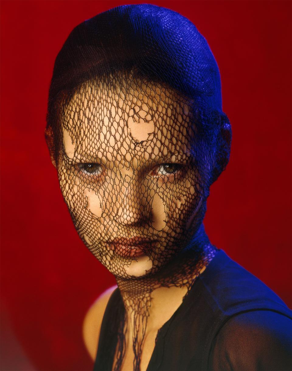 This image made available by Christie's auction house on Wednesday July 3, 2013 shows an image of British model Kate Moss, 'Kate Moss in Torn Veil', Marrakech, 1993 by Albert Watson. Few people have been photographed more often than Kate Moss, and some of the most famous images of the supermodel are going under the hammer at a Christie's auction in London on Sept. 25. (AP Photo/Christie's)
