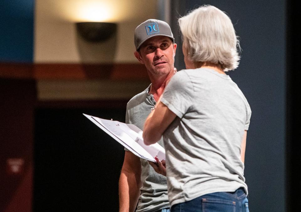 Actor Eric Kunze, playing Joe Gillis, works on stage with Karen Mason, playing Norma Desmond, during a rehearsal for "Sunset Boulevard" at The Helene Galen Performing Arts Center at Rancho Mirage High School in Rancho Mirage, Calif., Saturday, Nov. 12, 2022.