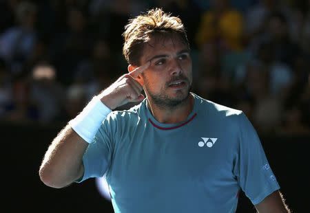 Tennis - Australian Open - Melbourne Park, Melbourne, Australia - 24/1/17 Switzerland's Stan Wawrinka gestures after winning his Men's singles quarter-final match against France's Jo-Wilfried Tsonga. REUTERS/Thomas Peter