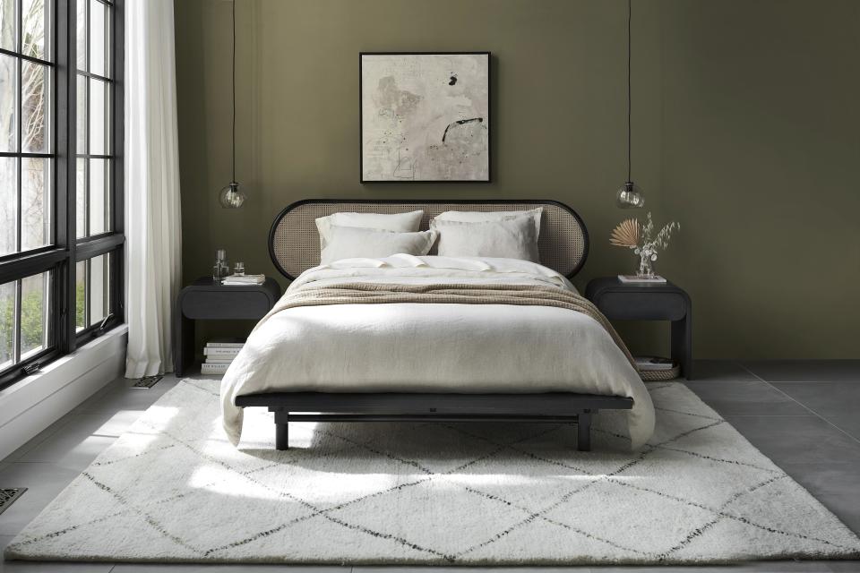 Two hot textural materials, rattan and jute, have moved from the porch and storage closet to just about every room in the home in the form of furniture and accessories. Crate & Barrel channels the 1930s with the curved-edge Anaise bedroom set. (Crate & Barrel via AP)
