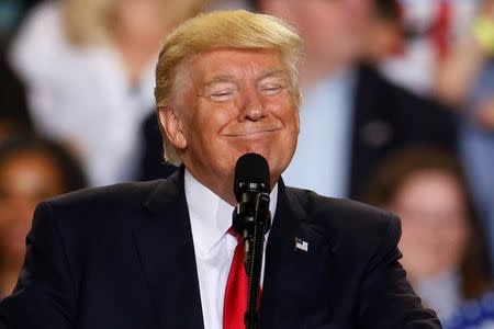 U.S. President Donald Trump appears on stage at a rally in Harrisburg, Pennsylvania, U.S. April 29, 2017. REUTERS/Carlo Allegri