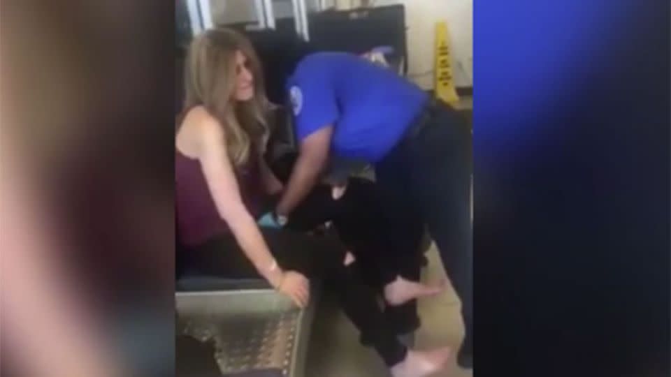 The video captured shows a security guard at LAX Airport touching Denise Albert. Source:  Twitter.