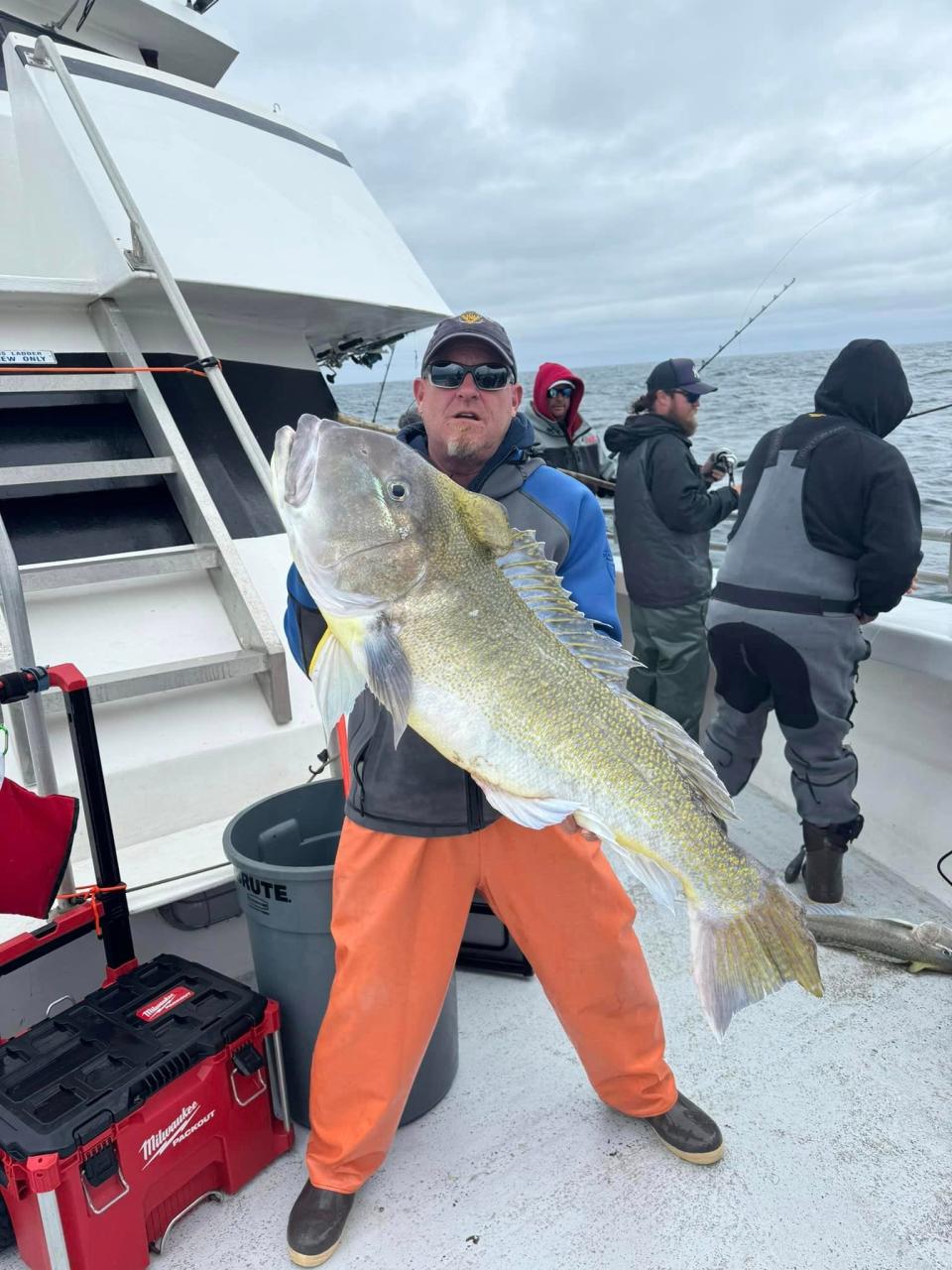 Steve Hagerman of Manchester holds a 45-pound golden tilefish he caught offshore fishing on the Gambler party boat.