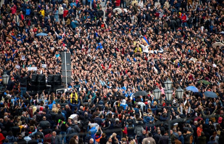 Tens of thousands protested in Armenia's capital against what they say is a power-grab by ex-president Serzh Sarkisian, as police arrested more than 230 people