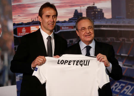 Soccer Football - Real Madrid present new coach Julen Lopetegui - Santiago Bernabeu, Madrid, Spain - June 14, 2018 New Real Madrid coach Julen Lopetegui poses with the shirt with president Florentino Perez during the presentation REUTERS/Juan Medina