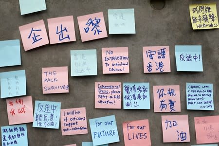 Notices of anti-extradition bill are seen near the Legislative Council building in Hong Kong