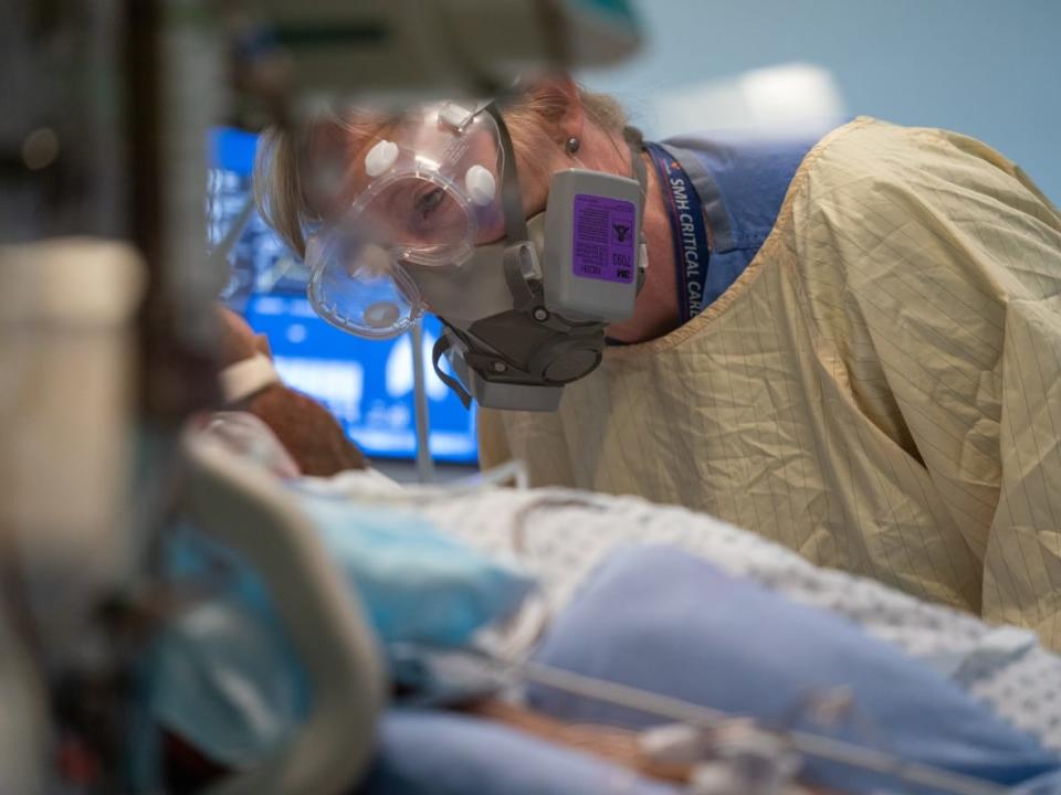 Fifty New Brunswickers are hospitalized for or with COVID as of Saturday, including five in intensive care, according to the regional health networks. (Jonathan Hayward/The Canadian Press - image credit)