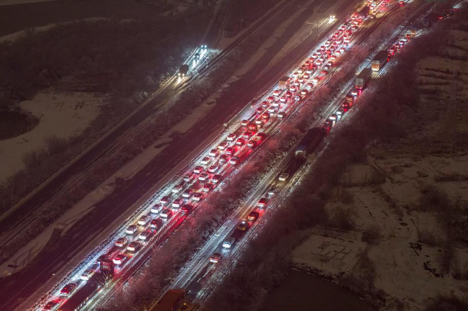 Aerial view of cars stuck in traffic jams caused by a heavy snowfall in Wuhan, China.