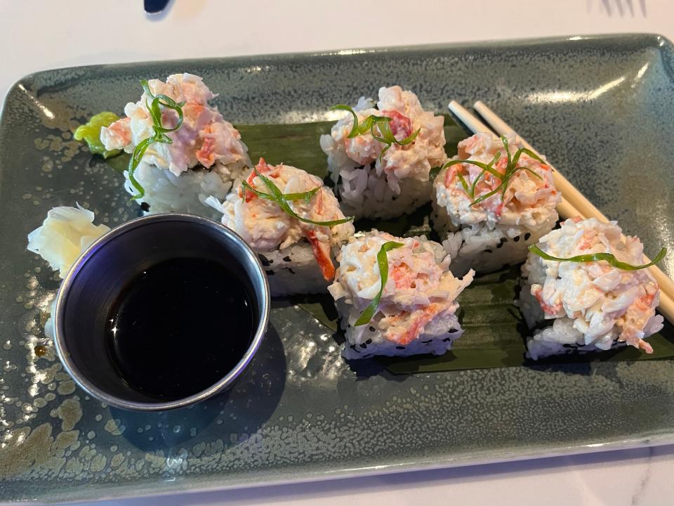 King-crab sushi with a cup of soy sauce