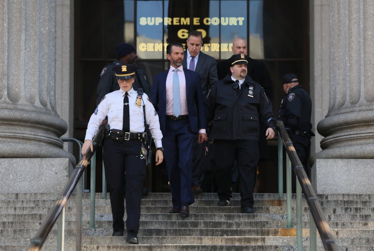 Donald Trump Jr is pictured leaving New York Supreme Court on 2 November (REUTERS)