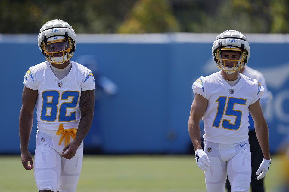 Los Angeles Chargers wide receiver Brenden Rice, left, and wide receiver Ladd McConkey get set to run a drill during an NFL rookie minicamp football practice Friday, May 10, 2024, in Costa Mesa, Calif. (AP Photo/Mark J. Terrill)