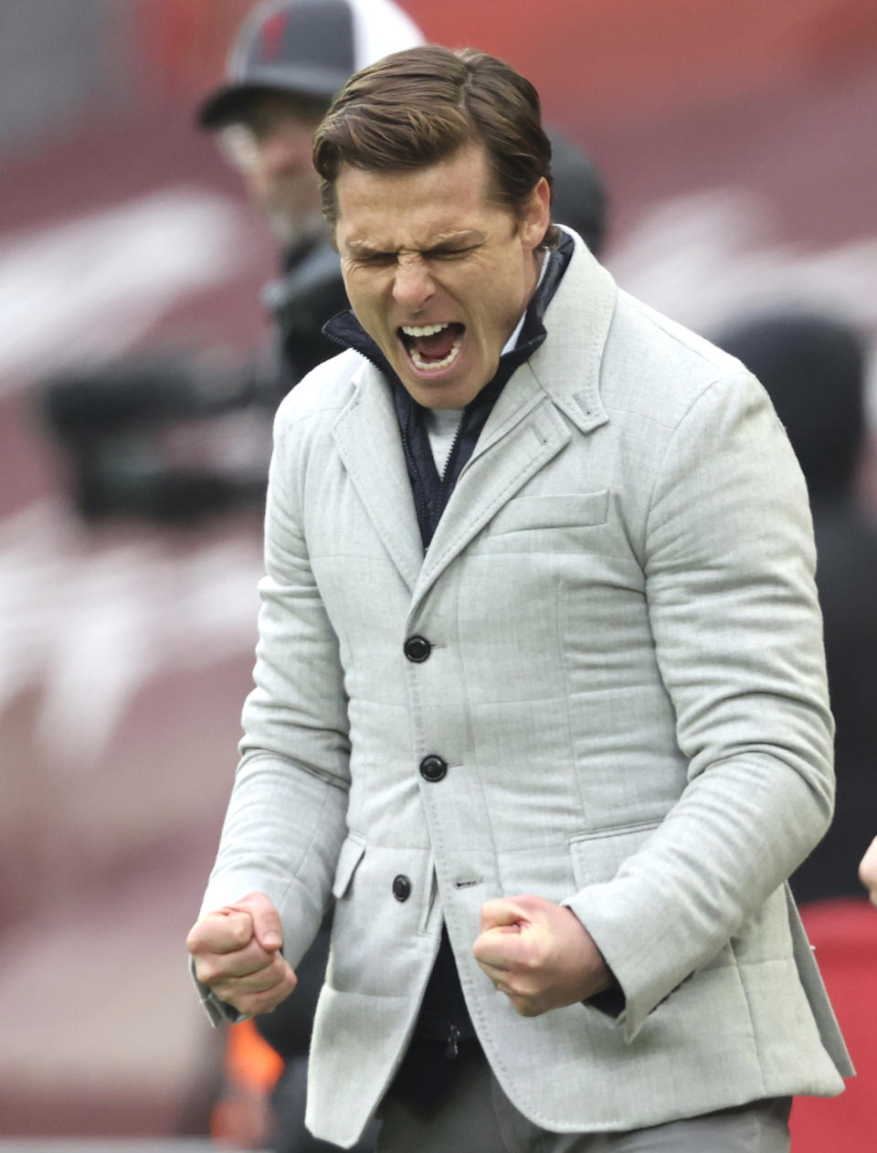 Fulham's manager Scott Parker reacts after the English Premier League soccer match between Liverpool and Fulham at Anfield stadium in Liverpool, England, Sunday, March 7, 2021. (Clive Brunskill/Pool via AP)