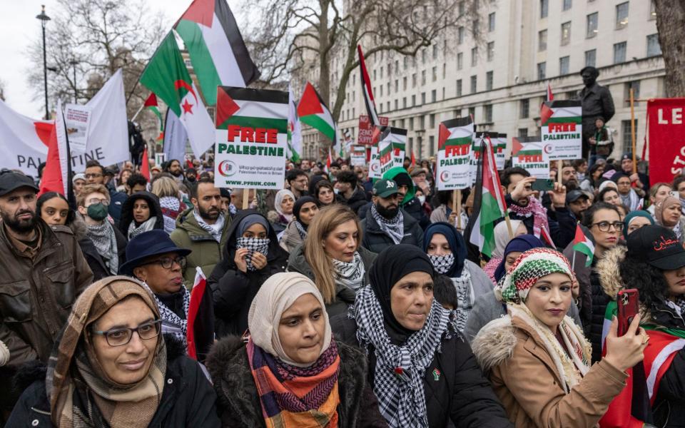 Marchers protest outside Downing Street today