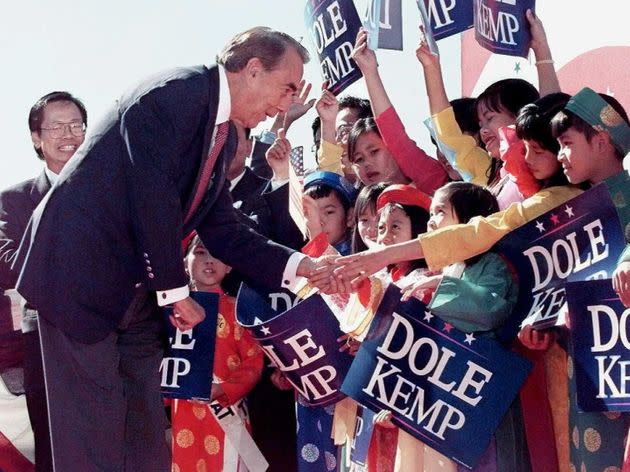 Dole greets students at Van Lang Vietnamese School in San Jose, California, while he was a presidential candidate in October 1996. (Photo: DAVID AKE via Getty Images)