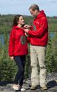 <p>Will helps Kate with her sweatshirt, after the couple were made honorary members of the Canadian Rangers.<br></p>