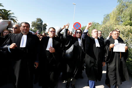 Tunisian lawyers demonstrate against the government's proposed new taxes outside parliament in Tunis, Tunisia November 23, 2016. REUTERS/Zoubeir Souissi