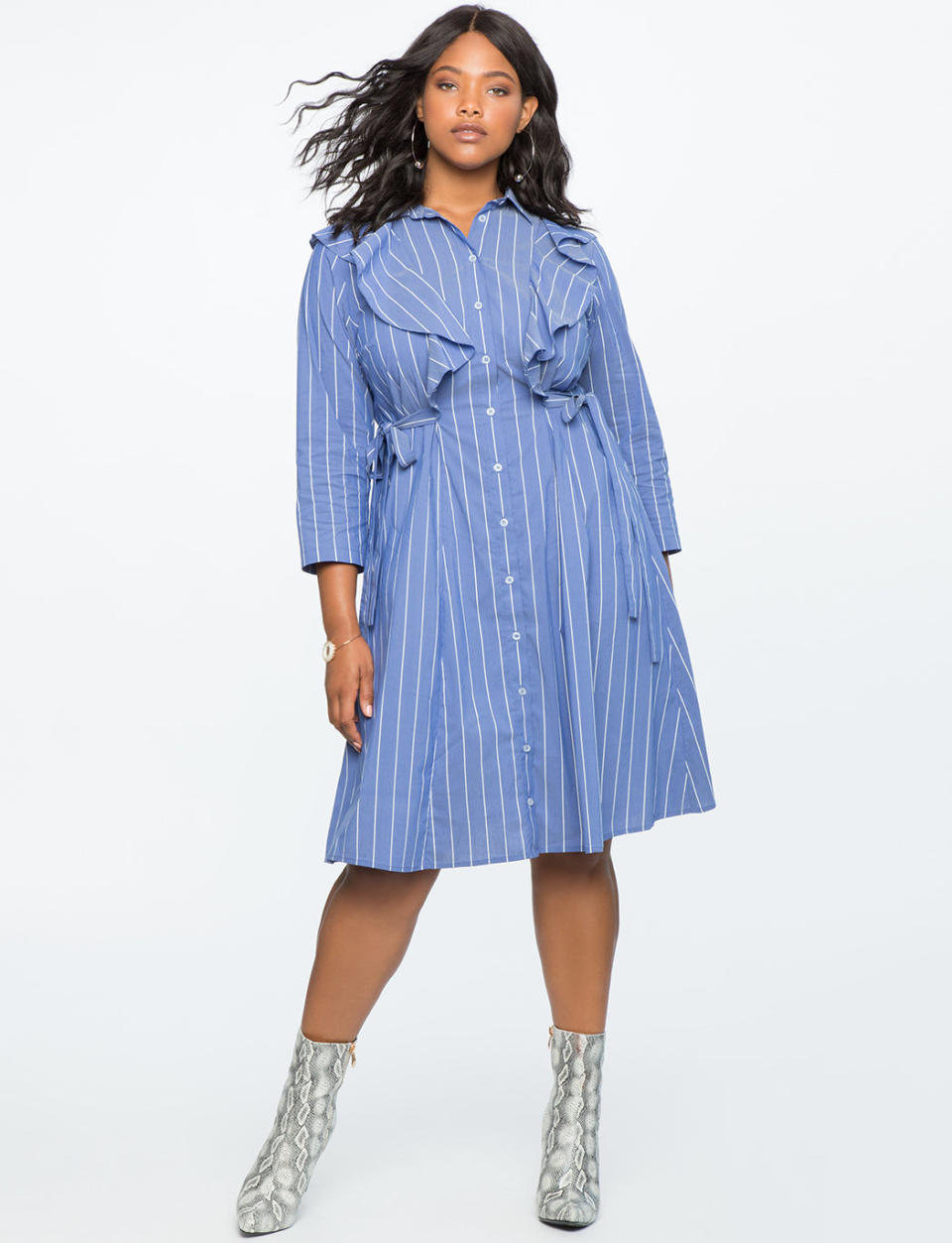 <a href="http://www.eloquii.com/pinstripe-hi-low-shirtdress/1245192.html?cgid=2628-dresses&amp;start=31&amp;dwvar_1245192_colorCode=53" target="_blank">Shop it at Eloquii</a>.&nbsp;