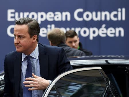 British Prime Minister David Cameron arrives for a European Union leaders summit addressing the talks about the so-called Brexit and the migrants crisis in Brussels, Belgium, February 18, 2016. REUTERS/Dylan Martinez