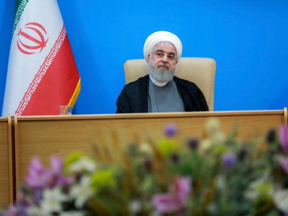 Iranian president Hassan Rouhani said the White House was “mentally retarded” (AP)