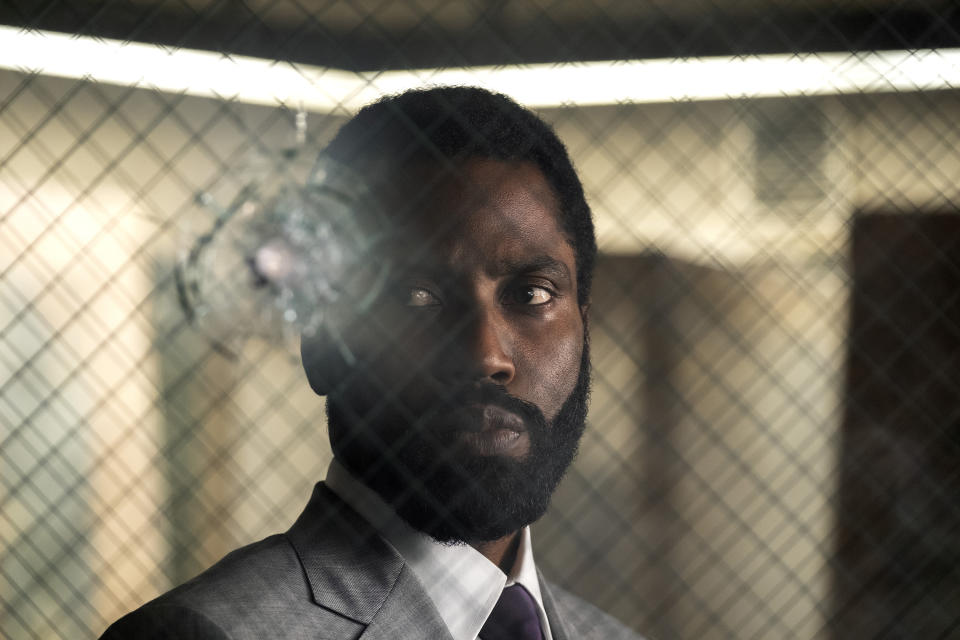 This image released by Warner Bros. Entertainment shows John David Washington in a scene from "Tenet." Warner Bros. says it is delaying the release of Christopher Nolan's sci-fi thriller “Tenet” until Aug. 12. (Melinda Sue Gordon/Warner Bros. Entertainment via AP)