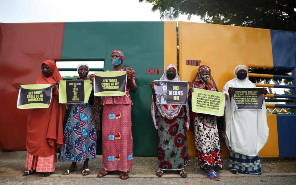 Protesters raise awareness about rising sexual violence outside police headquarters in Abuja, Nigeria - Kula Sulaimon /AFP