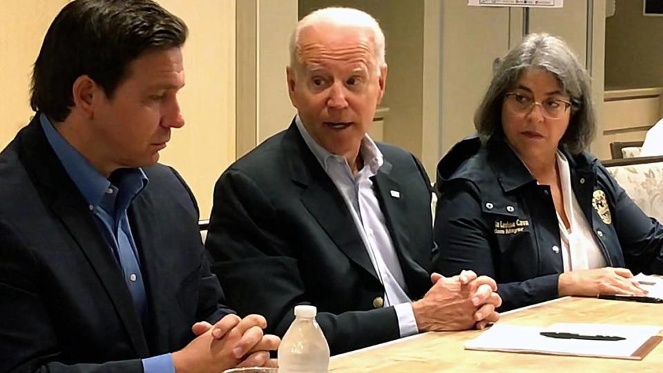 President Joe Biden during a meeting with officials at the St. Regis Hotel on Thursday, July 1, 2021. Florida Governor Ron DeSantis (L) and Miami-Dade Mayor Daniella Levine Cava (R) are seated with the President.