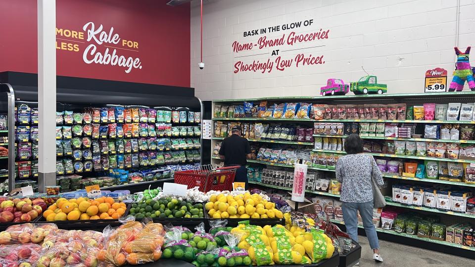 Customers shop at a Grocery Outlet store in Pleasanton, Calif., on Thursday, Sept. 15, 2022. "Best before” labels are coming under scrutiny as concerns about food waste grow around the world. Manufacturers have used the labels for decades to estimate peak freshness. But “best before” labels have nothing to do with safety, and some worry they encourage consumers to throw away food that’s perfectly fine to eat. (AP Photo/Terry Chea)