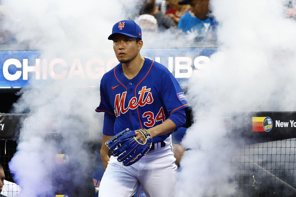 New York Mets starting pitcher Kodai Senga (34) takes the field before the start of a baseball game against the Chicago Cubs, Monday, Aug. 7, 2023, in New York. (AP Photo/Rich Schultz)