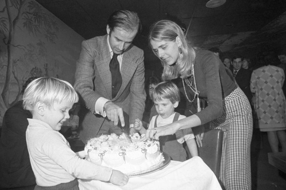 Joe Biden and wife Neilia cut his 30th birthday cake at a party on 20 November 1972 (Bettmann Archive)
