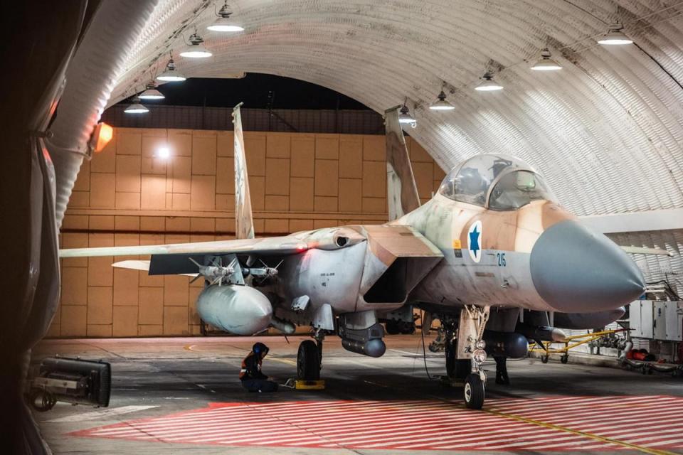 This handout picture released by the Israeli Army on 14 April 2024 shows an Israeli Air Force fighter aircraft at an undisclosed airfield reportedly after a mission to intercept incoming airborne threats (Israeli Army/AFP via Getty Image)
