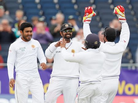 Britain Cricket - England v Sri Lanka - Second Test - Emirates Durham ICG - 27/5/16 Sri Lanka's Lahiru Thirimanne celebrates taking a catch to dismiss England's James Vince (not pictured) Action Images via Reuters / Jason Cairnduff Livepic EDITORIAL USE ONLY.