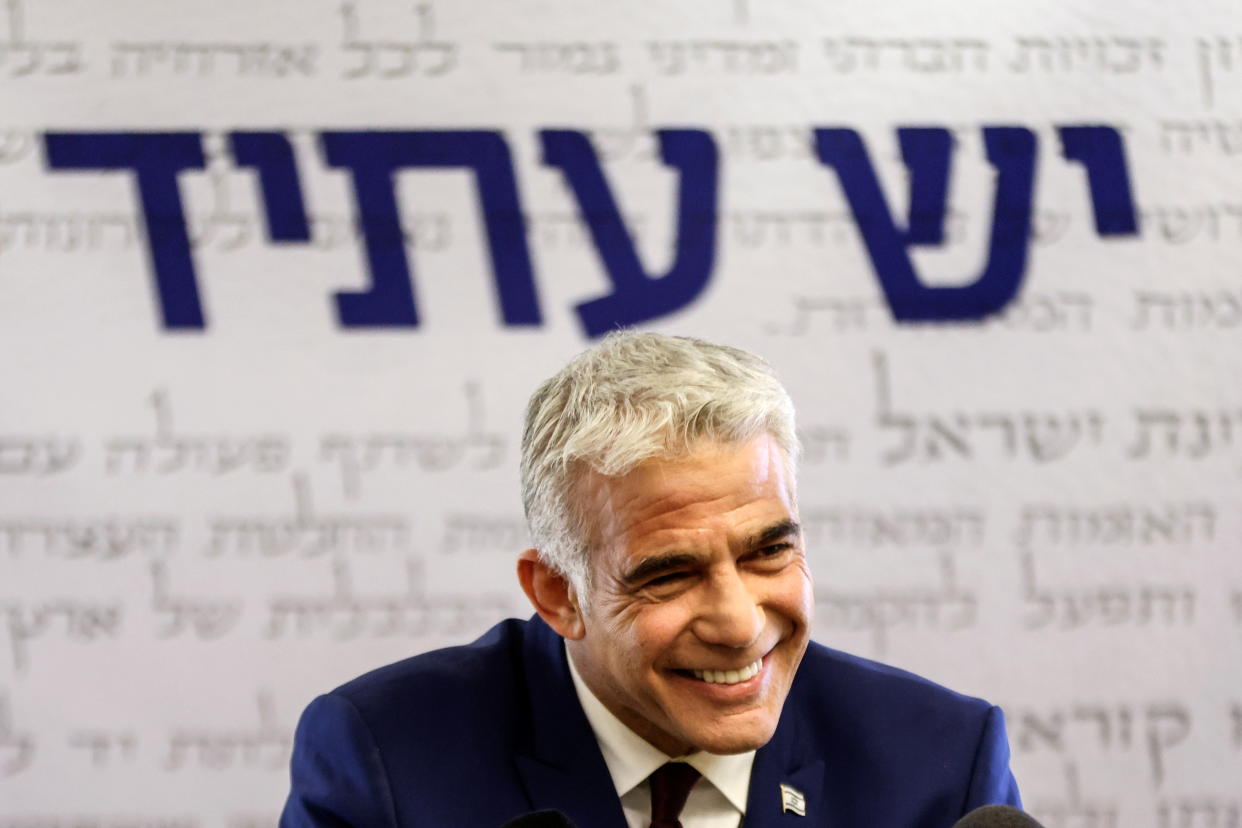 Yesh Atid party leader, Yair Lapid, speaks to the media in the Knesset, Israel's parliament, in Jerusalem, June 7, 2021. (Ronen Zvulun/Reuters)