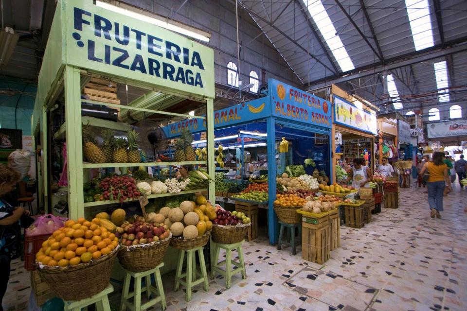 a market with baskets of produce