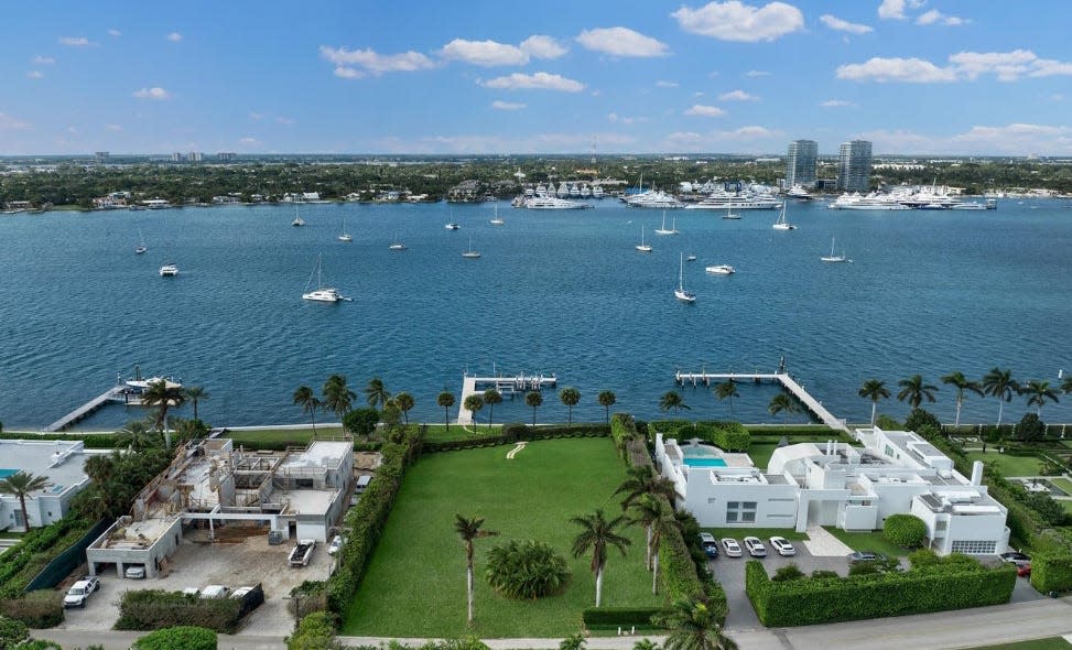 Harvey Cooper Jones Jr. razed a 1970s-era lakeside house that stood on this Palm Beach lot at 940 N. Lake Way, which he bought for a recorded $50 million in July 2023. Now listed at $55 million, the lot measures about four-fifths of an acre.