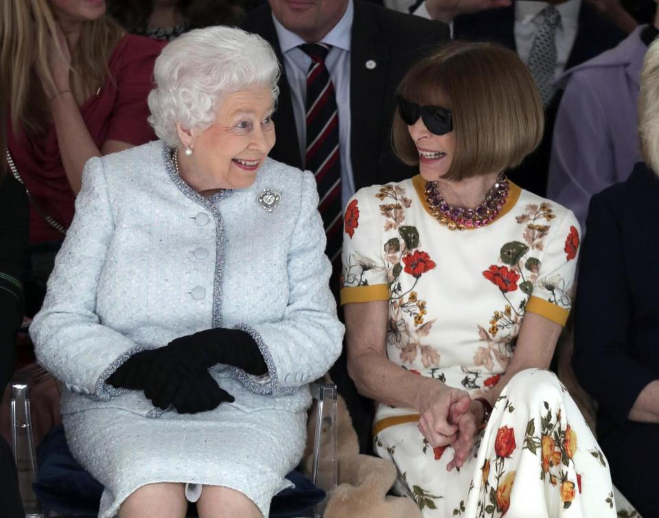 The Queen sat next to Anna Wintour at London Fashion Week (AP)