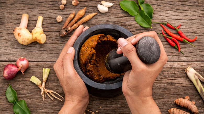 Ingredients grounded in mortar and pestle